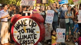 People protested outside the White House after President Trump announced the US would pull out of the Paris accord