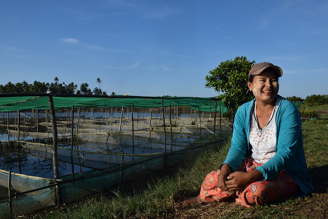 Clam farmer Thein Thein Sein is full of happiness as she looks upon her zero-investment clam farm in Myagi village of Shwe Thaung Yan sub township in Ayyerwady region of Myanmar. Credit: Stella Paul/IPS