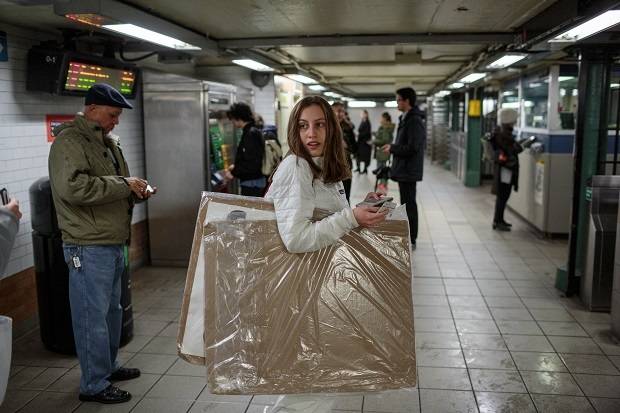 Alexandria commutes on the subway from her apartment in the Upper West Side to the U.N, holding her protest signs. Photo / Getty Images