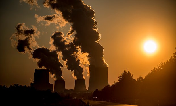 A coal-fired power station. ‘Massive CO2 extraction’ costing trillions is needed in order to avoid runaway temperature rises, says a new paper. Photograph: Florian Gaertner/Photothek via Getty Images