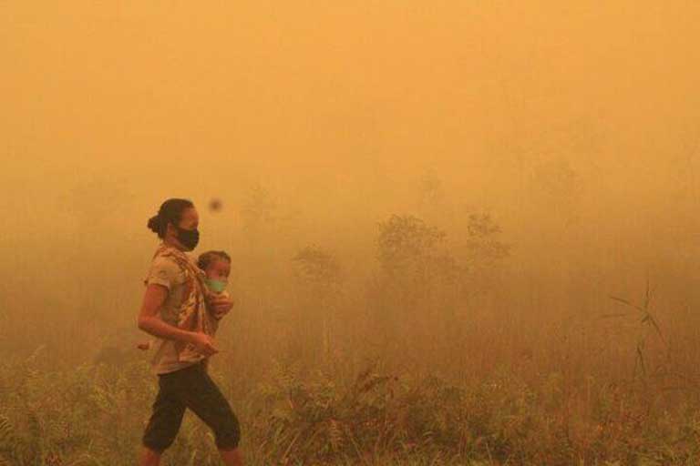 Indonesia on fire, October 16, 2015. The fires there were blamed on a record El Niño drought that was intensified by climate change, along with forest clearance for industrial agriculture. This image, posted to Twitter, purports to show the smoke-choked city of Palangkaraya on the island of Borneo.