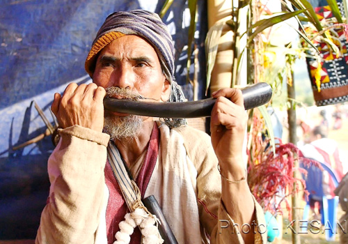 An old Karen with his traditional instrument. Photo - KESAN/Supplied