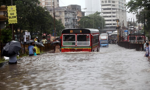  Heavy rain and flooded streets bring Mumbai to a virtual standstill. Photograph: Anadolu Agency/Getty