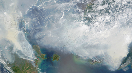 This NASA satellite image shows the haze from Indonesia’s 2015 fires over that country and its neighbors. Photo Courtesy of Adam Voiland (NASA Earth Observatory) and Jeff Schmaltz (LANCE MODIS Rapid Response)