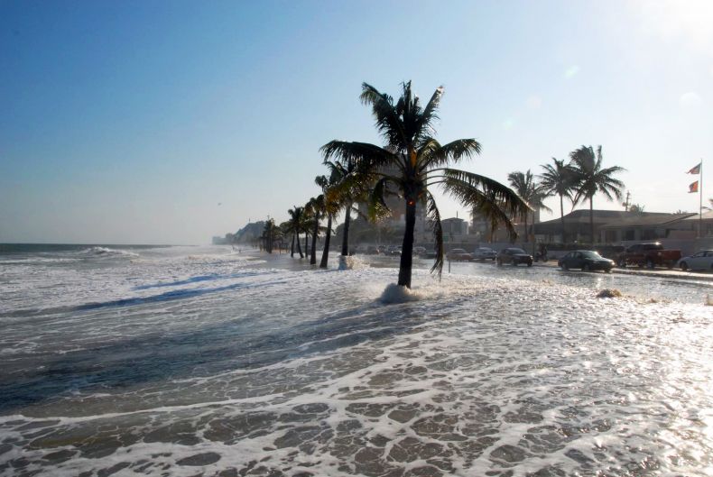 Rising sea levels, triggered by climate change, will inundate beaches and low-lying areas. Photo Credit: NASA