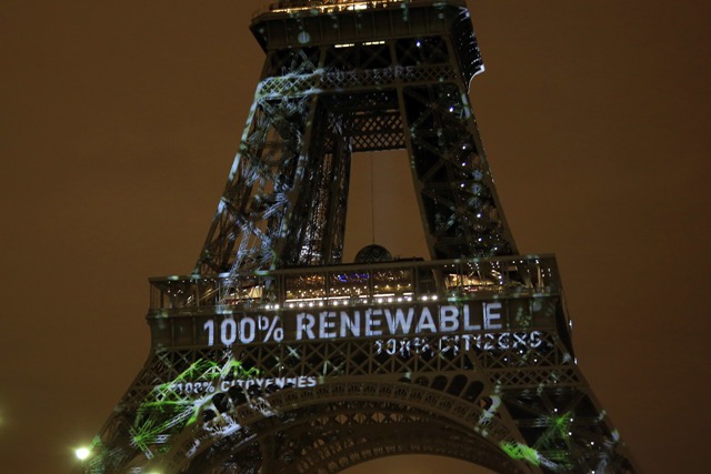 In this Sunday, Nov. 29, 2015 file photo, an artwork entitled 'One Heart One Tree' by artist Naziha Mestaoui is displayed on the Eiffel tower ahead of the 2015 Paris Climate Conference, in Paris. At least 20 countries are expected to formally join the Paris Agreement on climate change this week, greatly improving the pact’s chances of coming into force just a year after it was negotiated in the French capital, U.N. officials say. AP/Thibault Camus, File