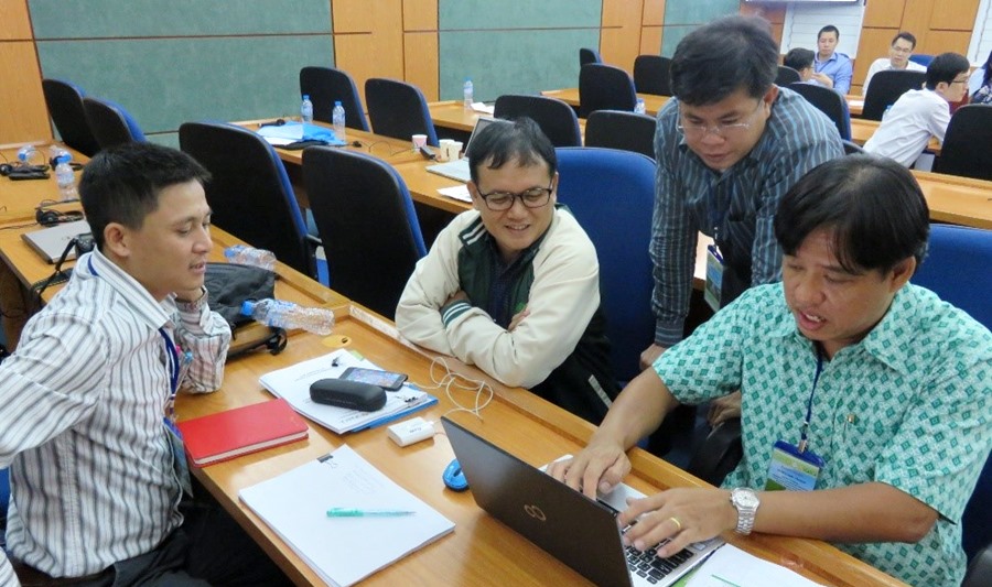 Participants discuss during the mini-workshop towards the development of concepts notes.