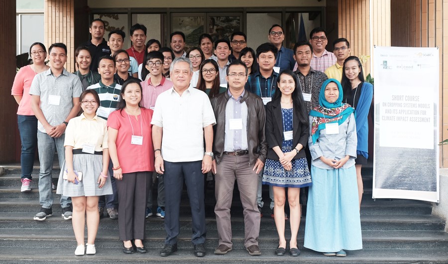 Participants of the Short Course on Cropping System Models and Its Application for Climate Impact Assessment at SEARCA, Los Baños, 4-8 September 2017, with Dr. Gil C. Saguiguit, Jr., SEARCA Director (middle front), and Dr. Perdinan and other lecturers from the Department of Geophysics and Meteorology, Bogor Agricultural University (front middle left to right)