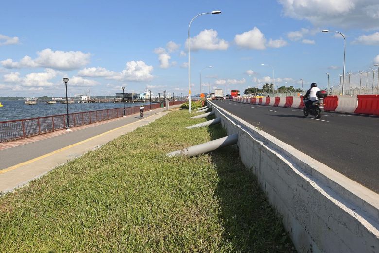 Singapore has already adopted various strategies to cope with coastal erosion and flooding as sea levels rise. In 2016, Singapore raised the coastal Nicoll Drive (above) in Changi by up to 0.8m.ST FILE PHOTO