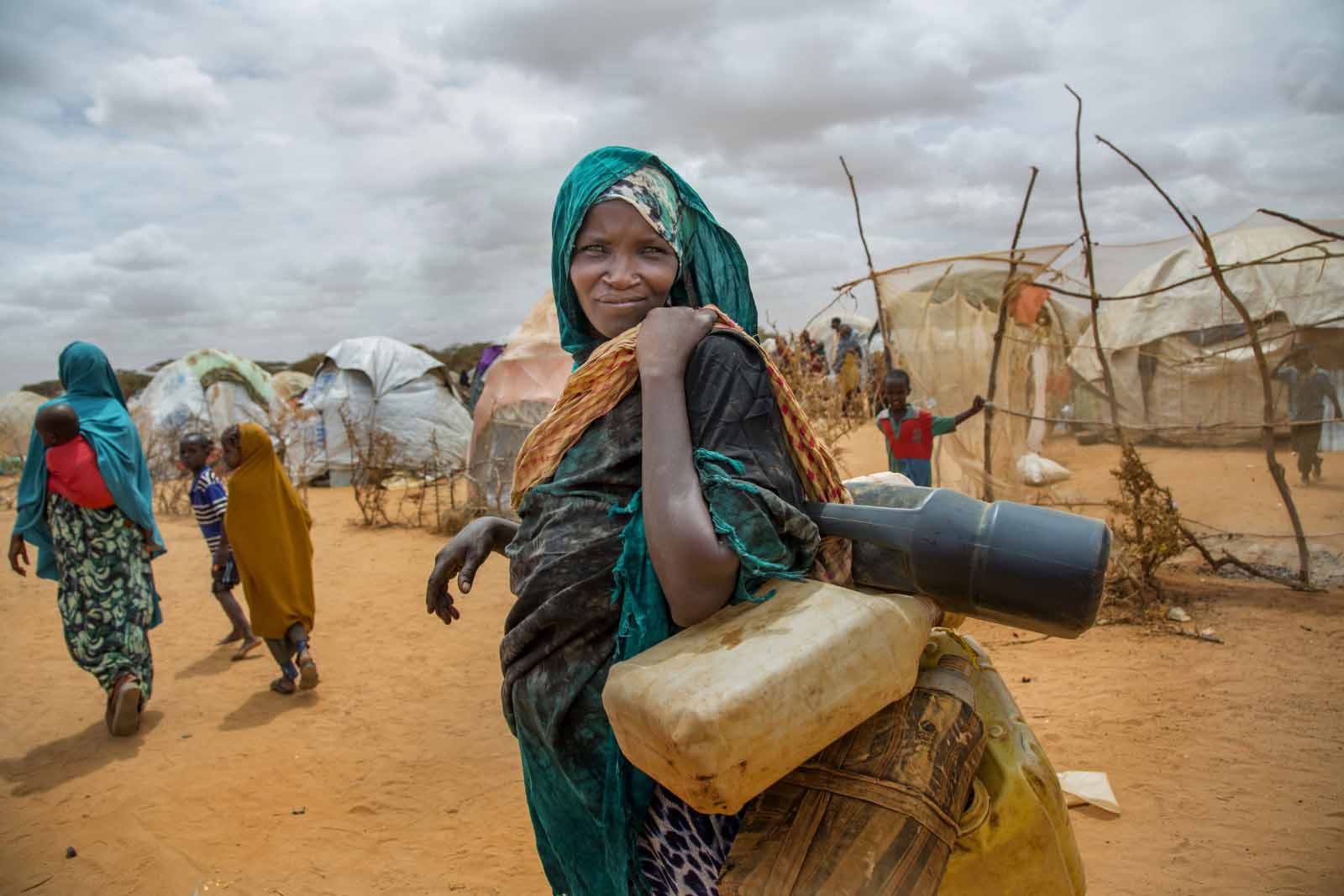 A photo on the Everyday Climate Change Instagram feed shows a Somali woman walking to collect water in Kapasa IDP Camp in Jubaland in June 2017. Photo by Georgina Goodwin