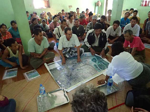 NGO Local community engagement in participatory workshop to assess potential for community forestry activities.