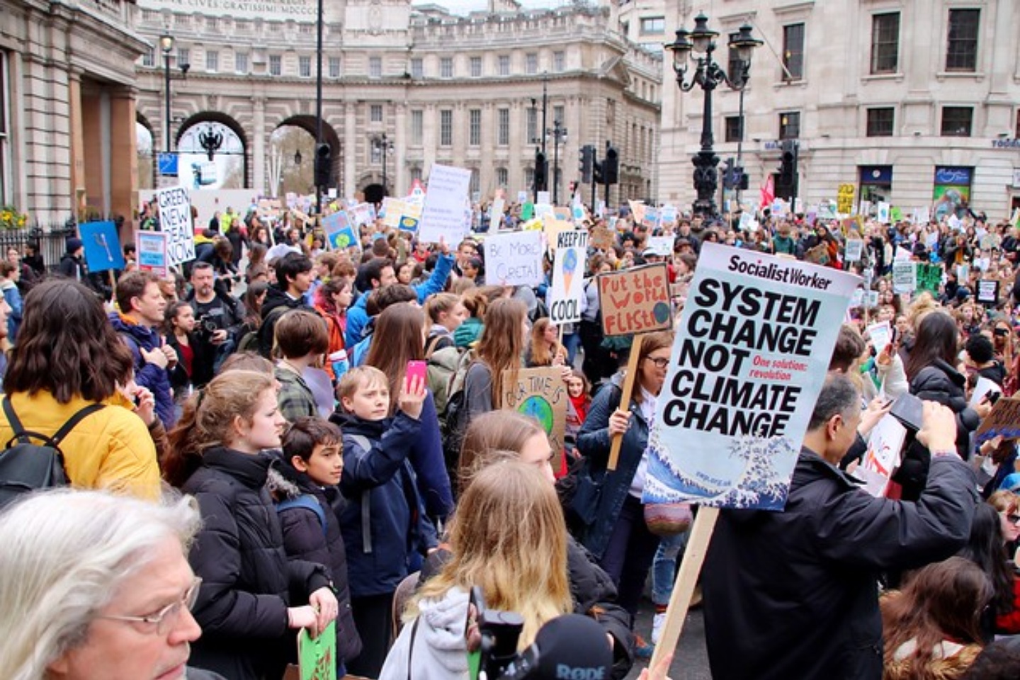 Young climate activists around the world are calling for system change in a world beset by climate change and widening inequality. Image: Roy/Flickr , CC BY-NC 2.0