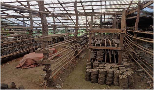 The time required for drying cookstoves during manufacture is problematic, especially during monsoon season. Taken at a cookstove manufacturer in Kalarkon, near Pathein.