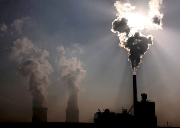 FILE PHOTO: A coal-burning power plant can be seen in the city of Baotou, in China’s Inner Mongolia Autonomous Region, October 31, 2010. REUTERS/David Gray/File Photo