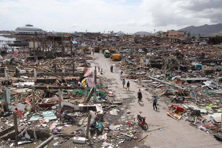 A file photo shows houses which were wrecked after a storm surge caused by super-typhoon Yolanda ravaged Tacloban City. (MANILA BULLETIN FILE PHOTO)