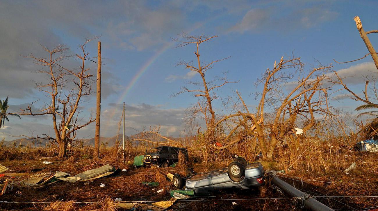 A rainbow is seen amid the destruction caused by Supertyphoon Yolanda in San Jose District, near the Tacloban Airport. Photo: Philippine Daily Inquirer