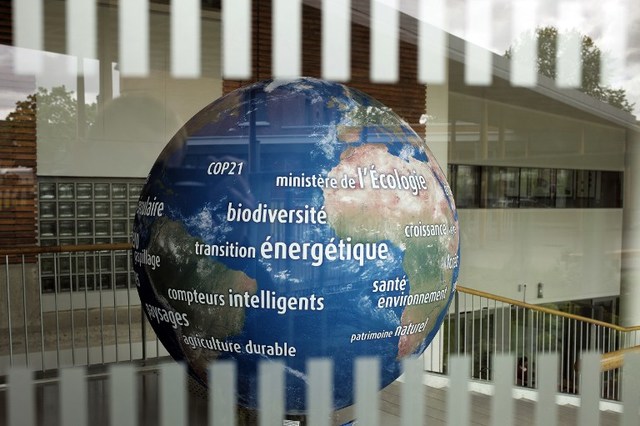 A picture taken on May 6, 2015 shows an earth globe at a school during a ministers' visit to students working on a project about global warming to prepare the COP21 international meetings, also known as 2015 Paris Climate Conference, in Le Bourget. Lionel Bonaventure/AFP