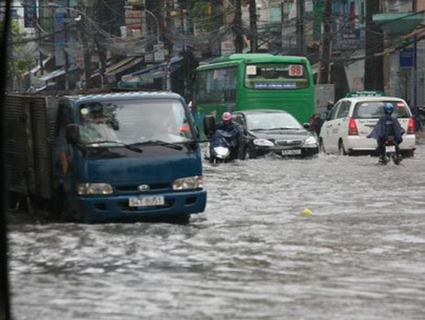 A street in Ho Chi Minh City is flooded after a heavy rain. File photo
