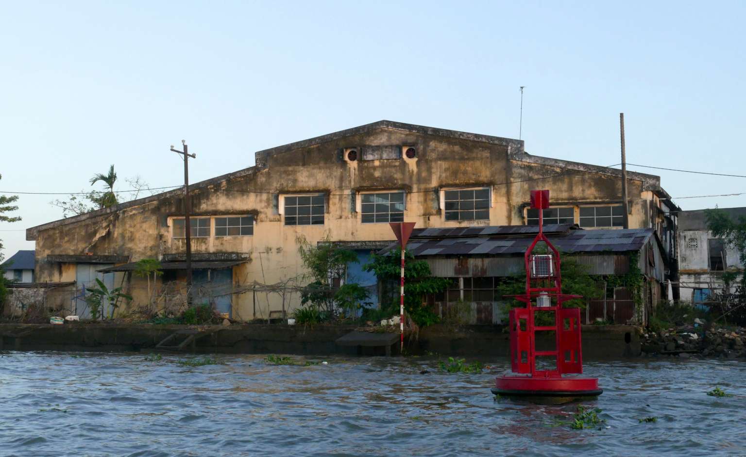 Sinking land, broken houses, (above) on the banks of the Hau river in Can Tho. Besides the usual problems of land subsidence, the people of this Vietnamese city in the Mekong Delta face new threats from climate change and, soon, dams. ST PHOTO: NIRMAL GHOSH